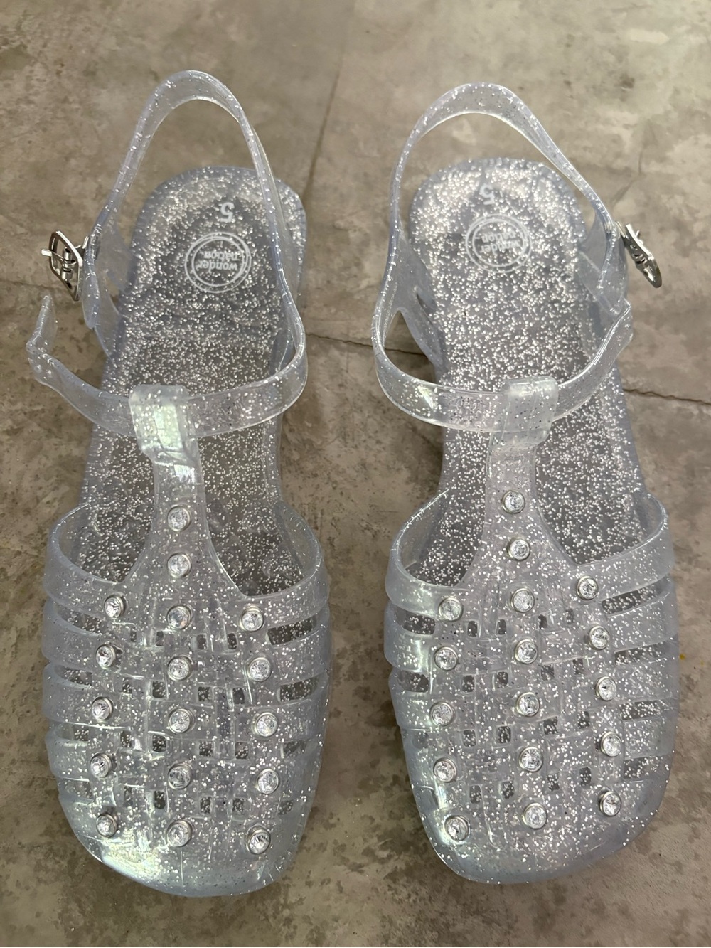 Wonder Nation clear jelly sandals silver glitter finish and a buckle strap
